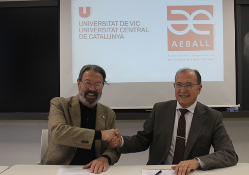  El rector de la UVic-UCC, Jordi Montaña, i de l'altra el president de l'AEBALL, Manuel Rosillo.